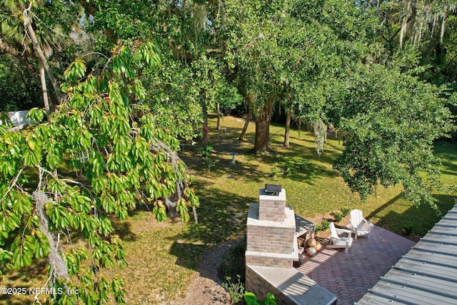 4 Pamela Pkwy, Palm Coast, FL 32137 - view of yard featuring a patio area