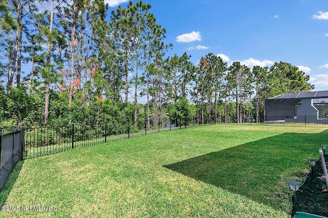 view of yard with a fenced backyard