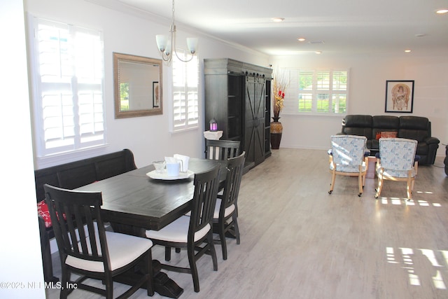 dining space with a chandelier, baseboards, ornamental molding, recessed lighting, and light wood-style floors