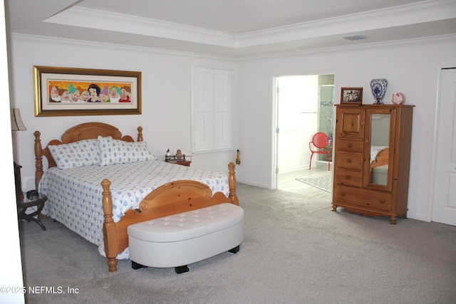 bedroom with visible vents, crown molding, and carpet floors