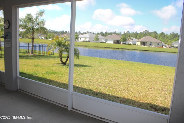 water view with a residential view and fence