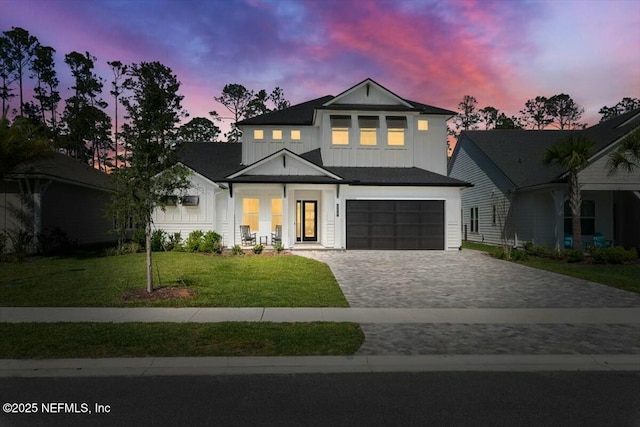 508 Palm Crest Dr, Ponte Vedra, FL 32081 - modern inspired farmhouse featuring decorative driveway, board and batten siding, a yard, and an attached garage