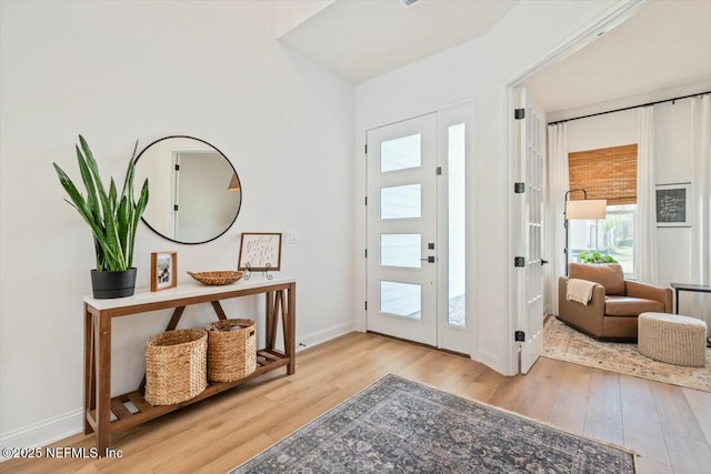 508 Palm Crest Dr, Ponte Vedra, FL 32081 - foyer featuring wood finished floors, healthy amount of natural light, and baseboards