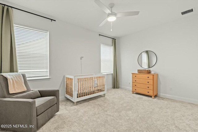 508 Palm Crest Dr, Ponte Vedra, FL 32081 - carpeted bedroom with a nursery area, baseboards, and ceiling fan