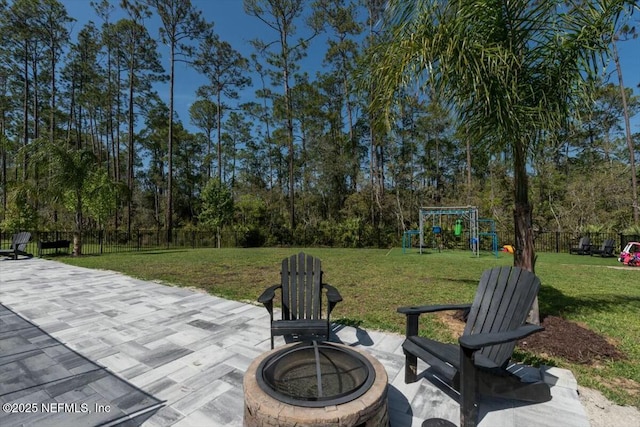 508 Palm Crest Dr, Ponte Vedra, FL 32081 - view of patio / terrace featuring a playground and an outdoor fire pit