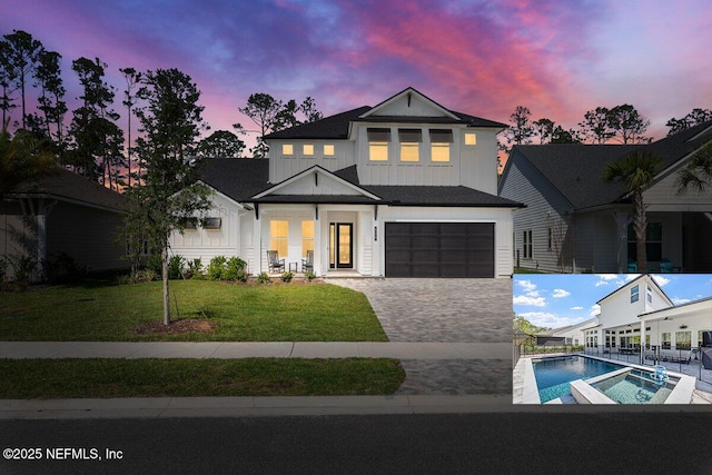 508 Palm Crest Dr, Ponte Vedra, FL 32081 - view of front of house with board and batten siding, a front yard, an attached garage, driveway, and a pool with connected hot tub