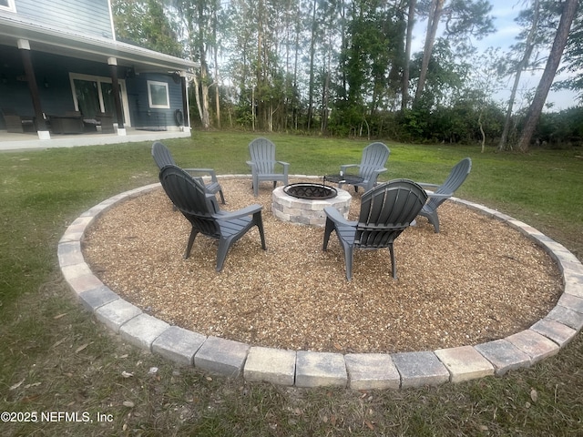 104 W Grandview Dr, East Palatka, FL 32131 - view of yard featuring a patio area and a fire pit