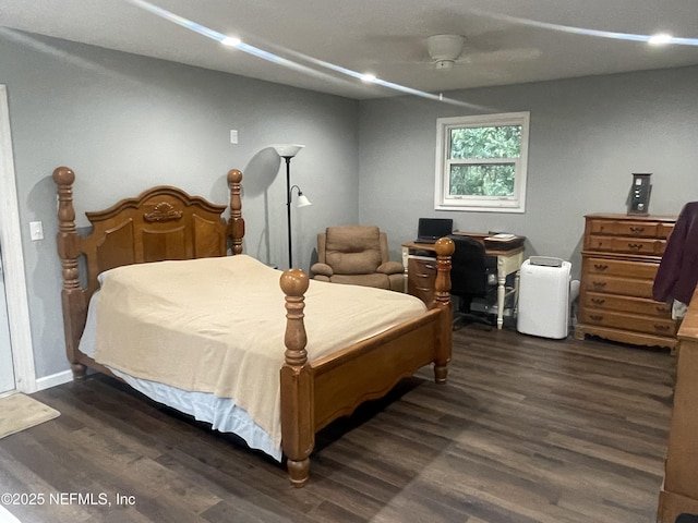 104 W Grandview Dr, East Palatka, FL 32131 - bedroom featuring dark wood-style flooring