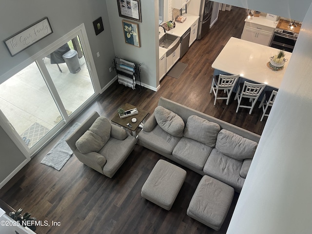 104 W Grandview Dr, East Palatka, FL 32131 - living room featuring baseboards and dark wood finished floors