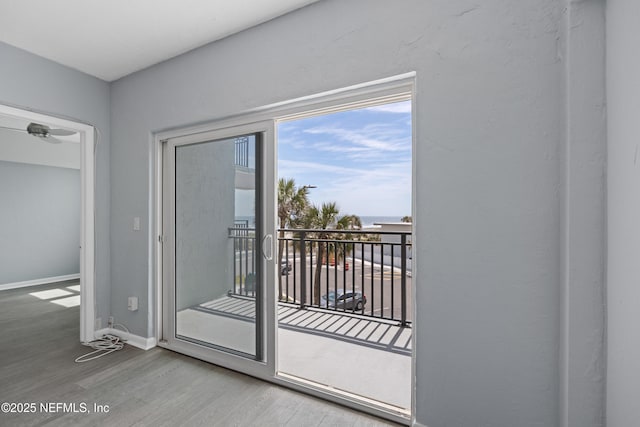 731 1st St S Unit 311, Jacksonville Beach, FL 32250 - entryway with baseboards and wood finished floors