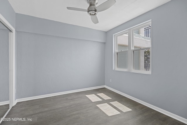 731 1st St S Unit 311, Jacksonville Beach, FL 32250 - empty room featuring a ceiling fan, baseboards, and wood finished floors