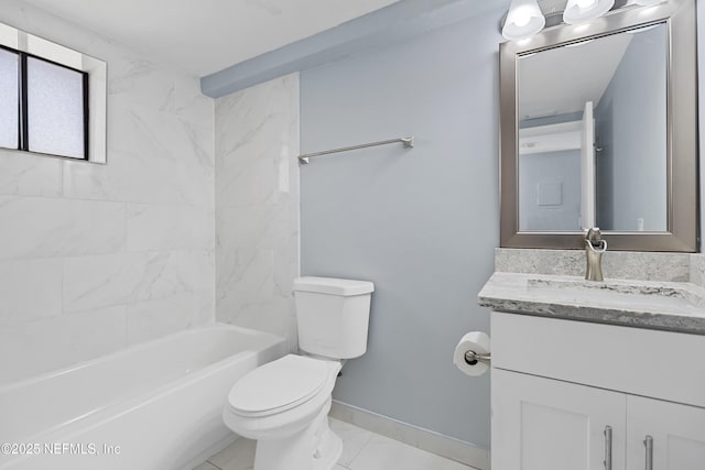 731 1st St S Unit 311, Jacksonville Beach, FL 32250 - bathroom with vanity, toilet, baseboards, marble finish floor, and washtub / shower combination