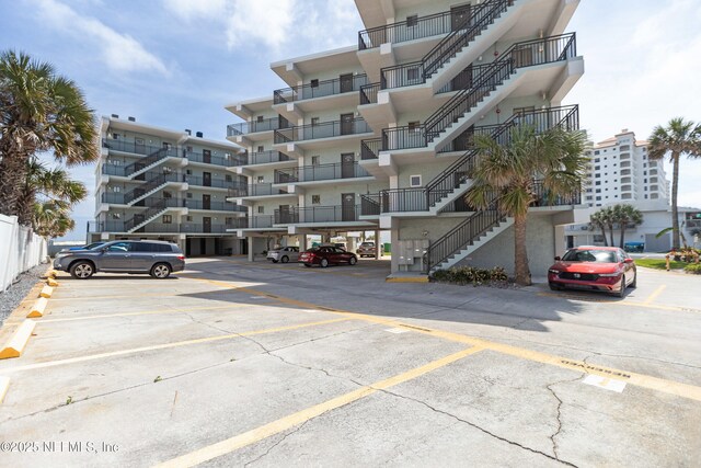 731 1st St S Unit 311, Jacksonville Beach, FL 32250 - view of property with uncovered parking