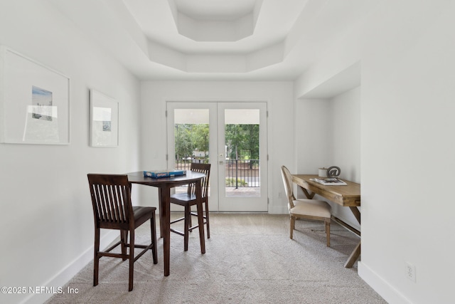 4520 Swilcan Bridge Ln N, Jacksonville, FL 32224 - dining space with french doors, light carpet, and baseboards