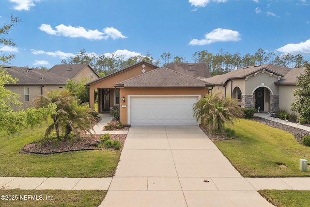 view of front of house featuring stucco siding, driveway, an attached garage, and a front yard