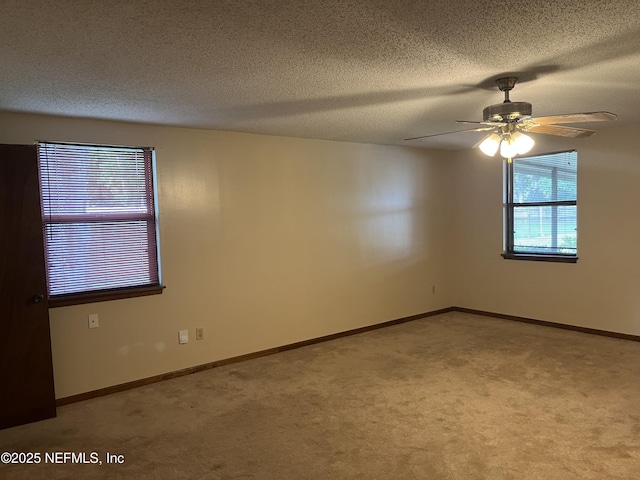 1933 Timucua Trl, Middleburg, FL 32068 - carpeted spare room featuring a textured ceiling and a ceiling fan