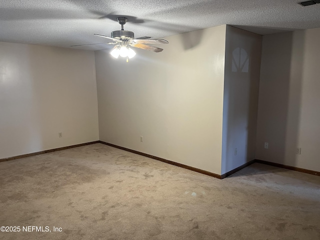 1933 Timucua Trl, Middleburg, FL 32068 - spare room featuring carpet floors, ceiling fan, and a textured ceiling