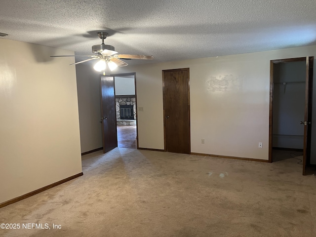 1933 Timucua Trl, Middleburg, FL 32068 - spare room with light colored carpet, ceiling fan, and a textured ceiling