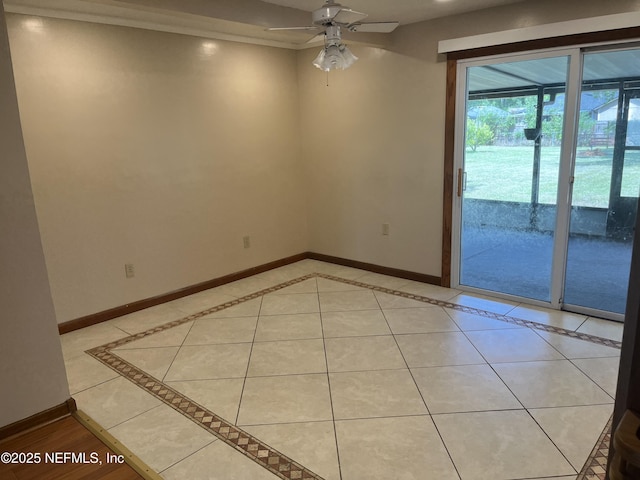 1933 Timucua Trl, Middleburg, FL 32068 - empty room featuring a ceiling fan, inlaid floor details, and light tile patterned flooring
