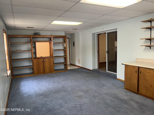 1933 Timucua Trl, Middleburg, FL 32068 - below grade area with a paneled ceiling and carpet