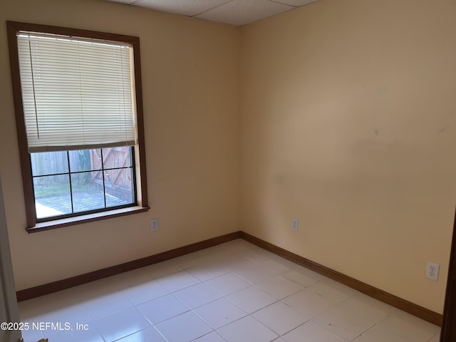 1933 Timucua Trl, Middleburg, FL 32068 - empty room with baseboards and a drop ceiling