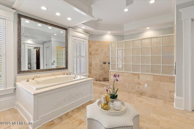bathroom featuring ornamental molding, recessed lighting, a garden tub, and a walk in shower