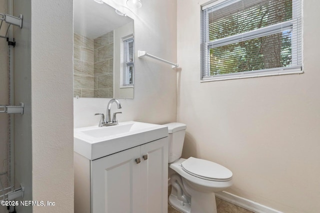 3047 Post St, Jacksonville, FL 32205 - bathroom featuring toilet, vanity, and baseboards