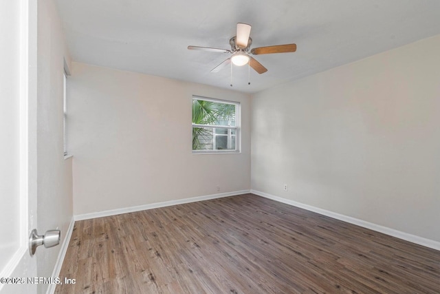 3047 Post St, Jacksonville, FL 32205 - empty room with baseboards, ceiling fan, and wood finished floors