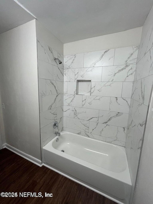 3047 Post St, Jacksonville, FL 32205 - bathroom featuring baseboards, shower / tub combination, and wood finished floors