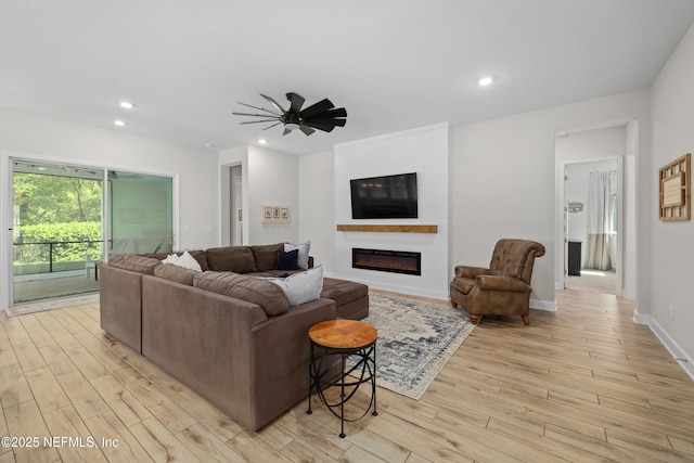 489 Windley Dr, Saint Augustine, FL 32092 - living room with a large fireplace, recessed lighting, and light wood-style floors