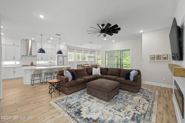489 Windley Dr, Saint Augustine, FL 32092 - living room featuring baseboards, recessed lighting, light wood-type flooring, and a ceiling fan