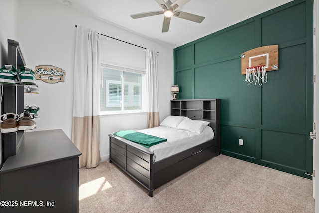 489 Windley Dr, Saint Augustine, FL 32092 - bedroom featuring a decorative wall, ceiling fan, and light carpet