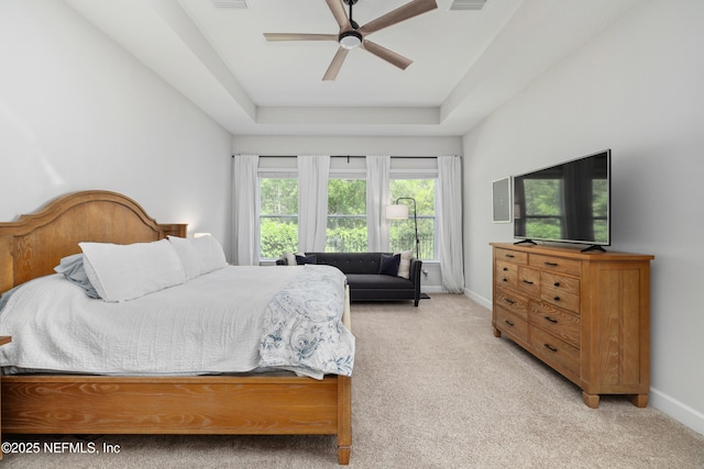 489 Windley Dr, Saint Augustine, FL 32092 - bedroom with visible vents, baseboards, a raised ceiling, ceiling fan, and light carpet