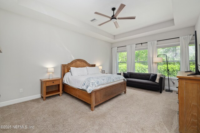 489 Windley Dr, Saint Augustine, FL 32092 - bedroom with a raised ceiling, light colored carpet, baseboards, and visible vents