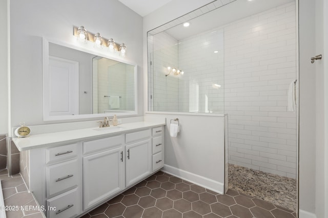 489 Windley Dr, Saint Augustine, FL 32092 - bathroom featuring tile patterned floors, walk in shower, and vanity