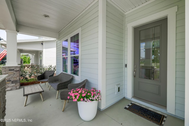 489 Windley Dr, Saint Augustine, FL 32092 - view of exterior entry featuring a porch