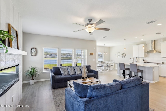 29 Stargaze Ln, Saint Augustine, FL 32095 - living room with healthy amount of natural light, ceiling fan, light wood-type flooring, and recessed lighting