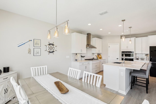 29 Stargaze Ln, Saint Augustine, FL 32095 - dining room with recessed lighting and light wood-style flooring