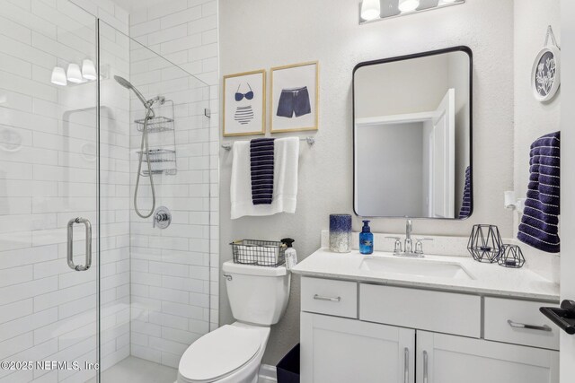 29 Stargaze Ln, Saint Augustine, FL 32095 - full bath featuring a stall shower, vanity, and toilet