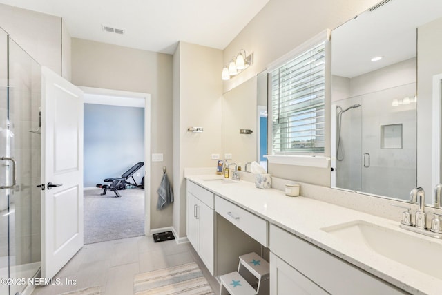 29 Stargaze Ln, Saint Augustine, FL 32095 - full bathroom with a shower stall, double vanity, tile patterned flooring, and baseboards