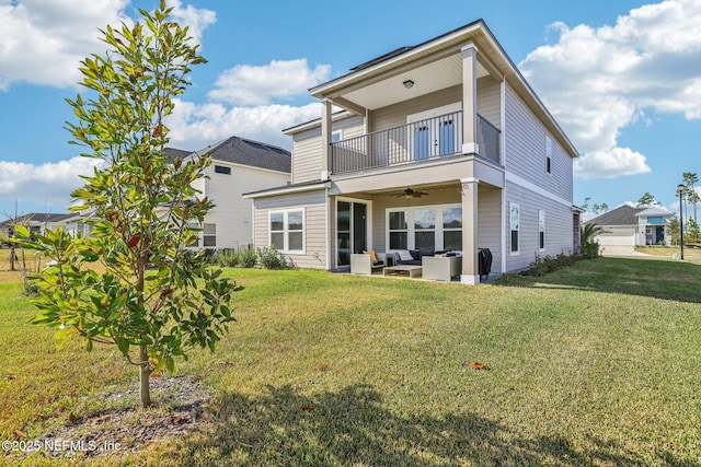 29 Stargaze Ln, Saint Augustine, FL 32095 - back of house with an outdoor hangout area, ceiling fan, a balcony, and a lawn