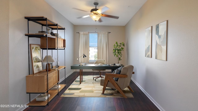 home office with baseboards, wood finished floors, and a ceiling fan