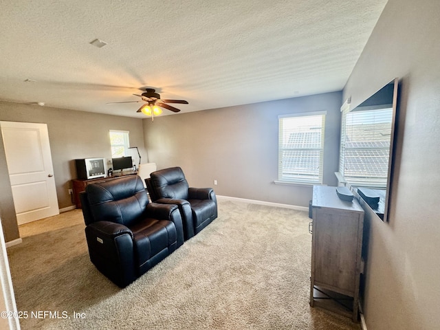 15949 Lexington Park Blvd, Jacksonville, FL 32218 - carpeted cinema featuring a textured ceiling, baseboards, and ceiling fan