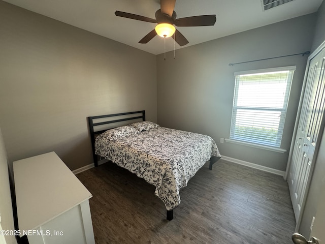 15949 Lexington Park Blvd, Jacksonville, FL 32218 - bedroom featuring baseboards, dark wood-style flooring, visible vents, and a ceiling fan