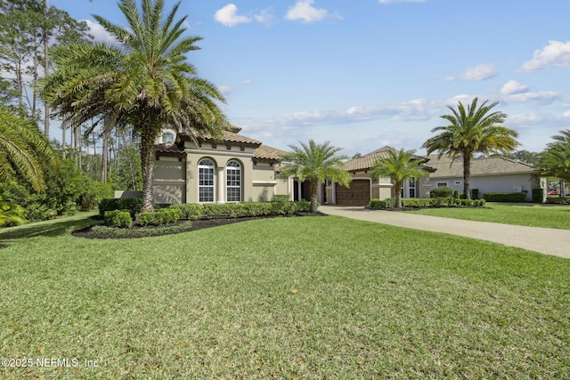 464 Deer Valley Dr, Ponte Vedra, FL 32081 - view of front of house featuring a garage, a front yard, stucco siding, a tile roof, and driveway