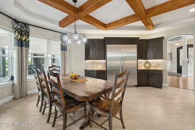 464 Deer Valley Dr, Ponte Vedra, FL 32081 - dining area featuring coffered ceiling, ornate columns, baseboards, arched walkways, and beam ceiling