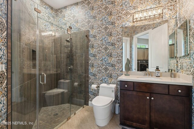 464 Deer Valley Dr, Ponte Vedra, FL 32081 - bathroom featuring wallpapered walls, vanity, toilet, and a shower stall