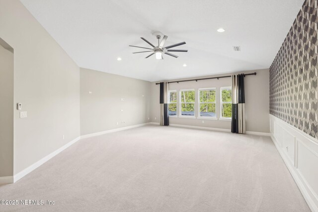 464 Deer Valley Dr, Ponte Vedra, FL 32081 - spare room featuring light colored carpet, visible vents, lofted ceiling, and ceiling fan