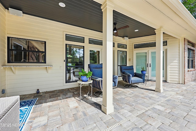 view of patio / terrace with french doors and ceiling fan