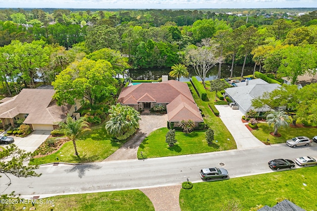 bird's eye view featuring a view of trees